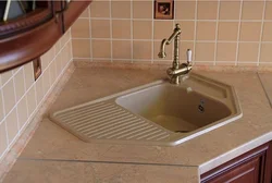 Photo of kitchen sinks made of artificial stone in the interior photo