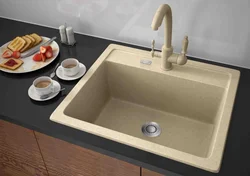 Photo of kitchen sinks made of artificial stone in the interior photo
