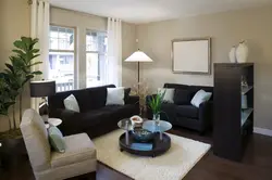 Living room interior with dark wallpaper and light furniture