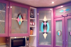 Photo of a kitchen with colored glass