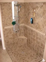 Shower tray made of tiles in the bathroom photo