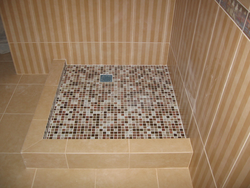 Shower tray made of tiles in the bathroom photo