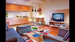 Living room kitchen design with sofa and TV photo