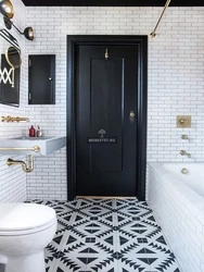 Bathroom design with dark door