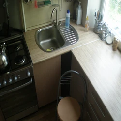 Sink And Stove In The Kitchen Photo