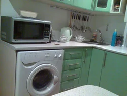 Kitchen in Khrushchev design with washing machine