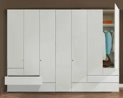 Design of hinged wardrobes in the living room
