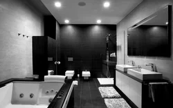 Black bathtub in the bathroom interior photo