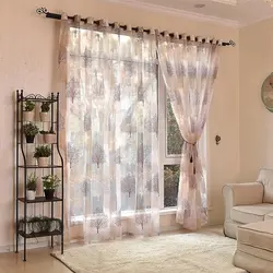Curtains and tulle in the living room photo