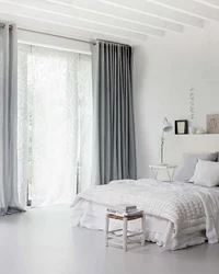 Curtains On The Wall In The Bedroom Interior Photo