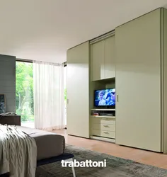 Wall cabinet with TV in the bedroom photo