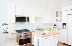 Photo of a kitchen with a white stove