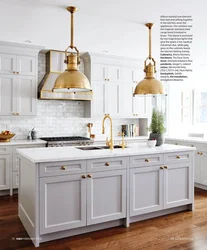 White kitchen with gold handles photo