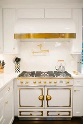 White kitchen with gold handles photo