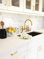 White Kitchen With Gold Handles Photo