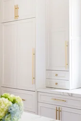 White Kitchen With Gold Handles Photo