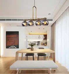 Лампы над столом на кухне фото