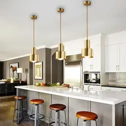 Lamps above the table in the kitchen photo
