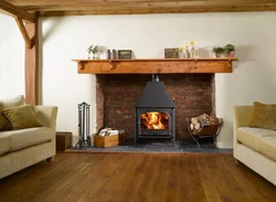 Fireplace stove design in the living room interior photo