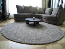 Round carpet in the living room interior