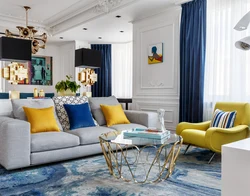 Beige living room interior with blue sofa