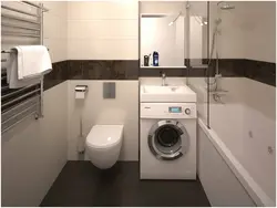 Black washing machine in the bathroom interior photo