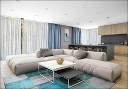 Дизайн гостиной с диваном в центре