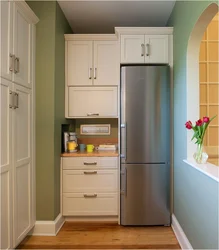 Refrigerator at the entrance to the kitchen photo