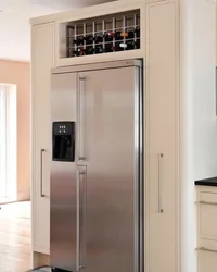 Refrigerator at the entrance to the kitchen photo