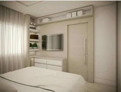 Interior design of a small bedroom with wardrobe