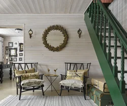 Interior of a living room in a country house made of clapboard