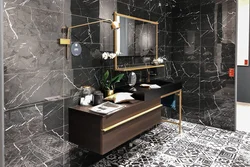 Bathroom design in black and white marble tiles