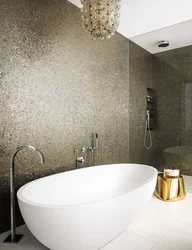 Bathtub With Decorative Plaster And Tiles Photo Design