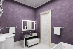 Bathtub with decorative plaster and tiles photo design