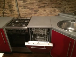 Kitchen in Khrushchev with dishwasher photo