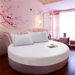 Круглая кровать в интерьере спальни фото