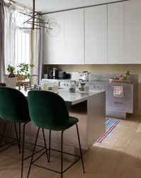 Kitchen With Emerald Chairs Photo