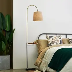 Floor lamps in the bedroom interior photo