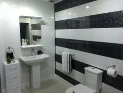 Bathroom design with self-adhesive panels