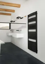 Полотенцесушитель черный в интерьере ванной