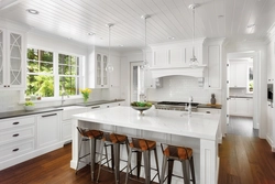 White kitchen design with island