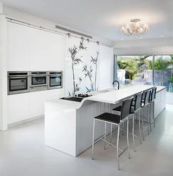 White kitchen design with island