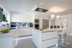 White kitchen design with island