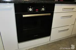 Белая кухня черный духовой шкаф фото