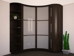 Large corner wardrobe in the bedroom photo