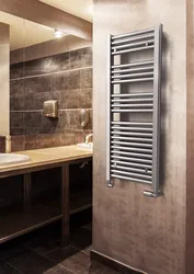 Bathroom with heated towel rail photo design