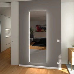 Mirror with lighting in the hallway wall-mounted interior