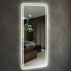 Mirror with lighting in the hallway wall-mounted interior