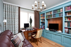 Books in the interior of the living room photo in a city apartment