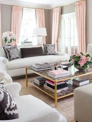 Pink curtains in a gray living room interior